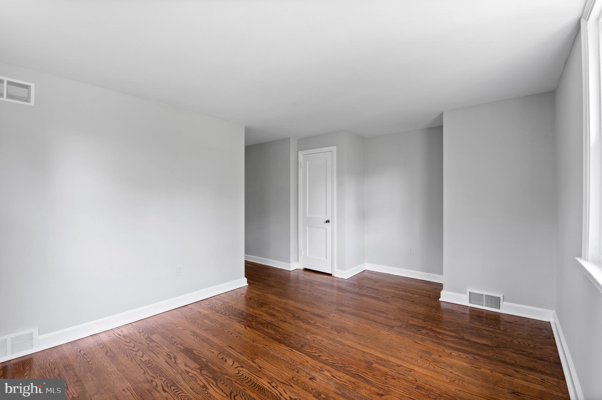 3731 School Lane Newtown Square, PA 19073 - Photo 23 of 31 a view of an empty room and wooden floor