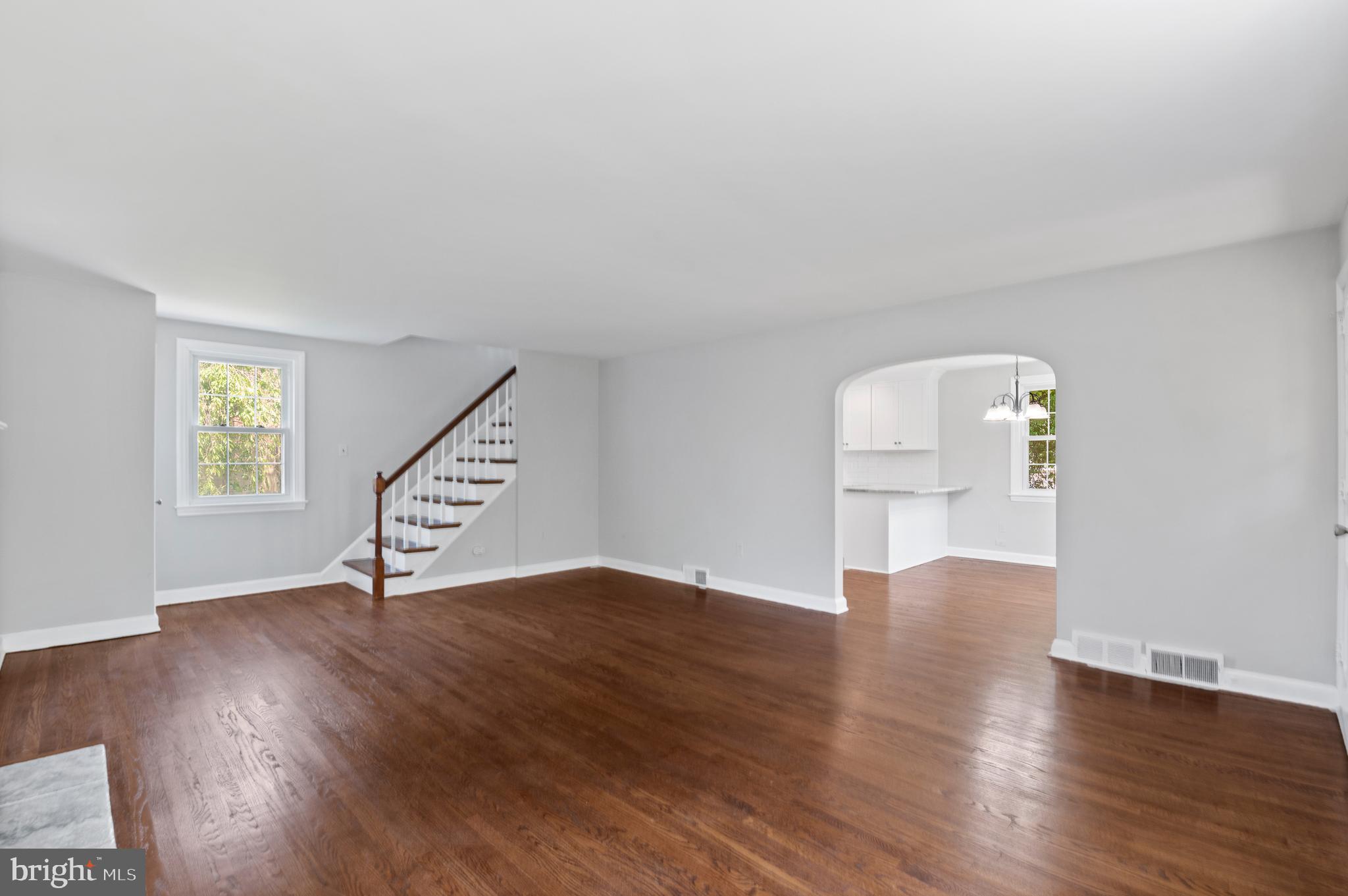3731 School Lane Newtown Square, PA 19073 - Photo 6 of 31 a view of an empty room with wooden floor and a window