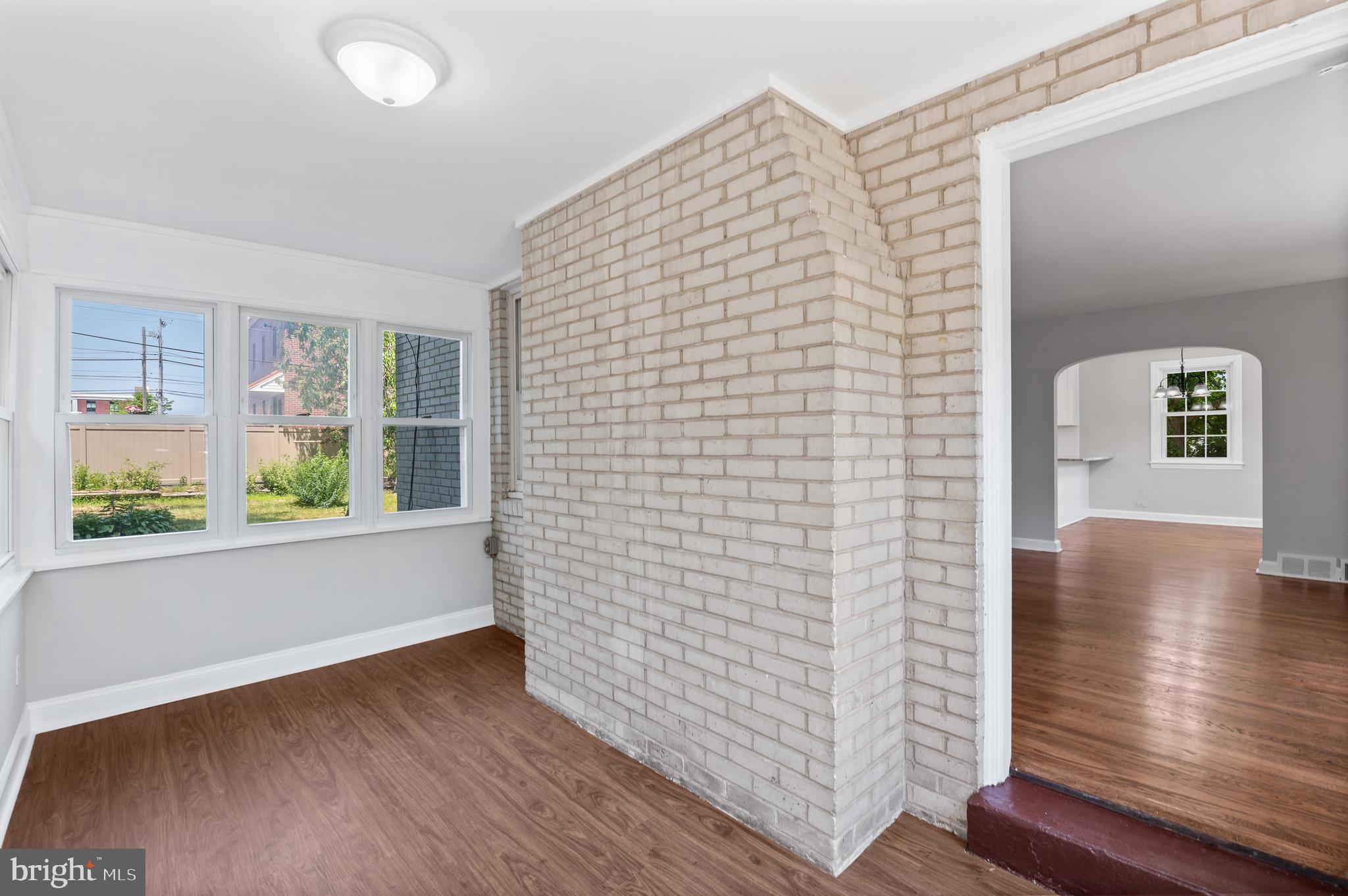 3731 School Lane Newtown Square, PA 19073 - Photo 8 of 31 a view of hallway with wooden floor and front door