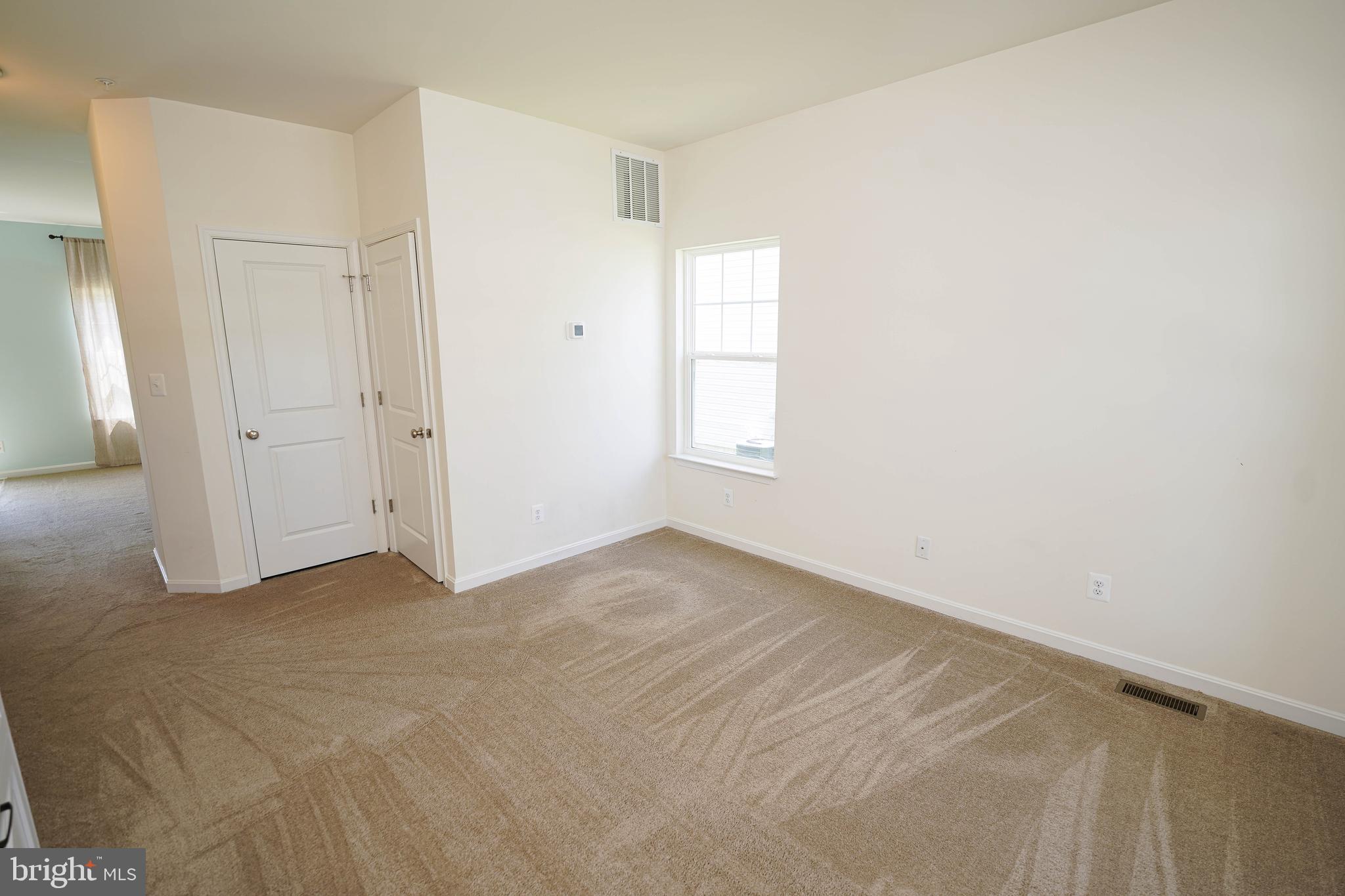322 Appleby School Road Cambridge, MD 21613 - Photo 13 of 58 a view of an empty room with a window