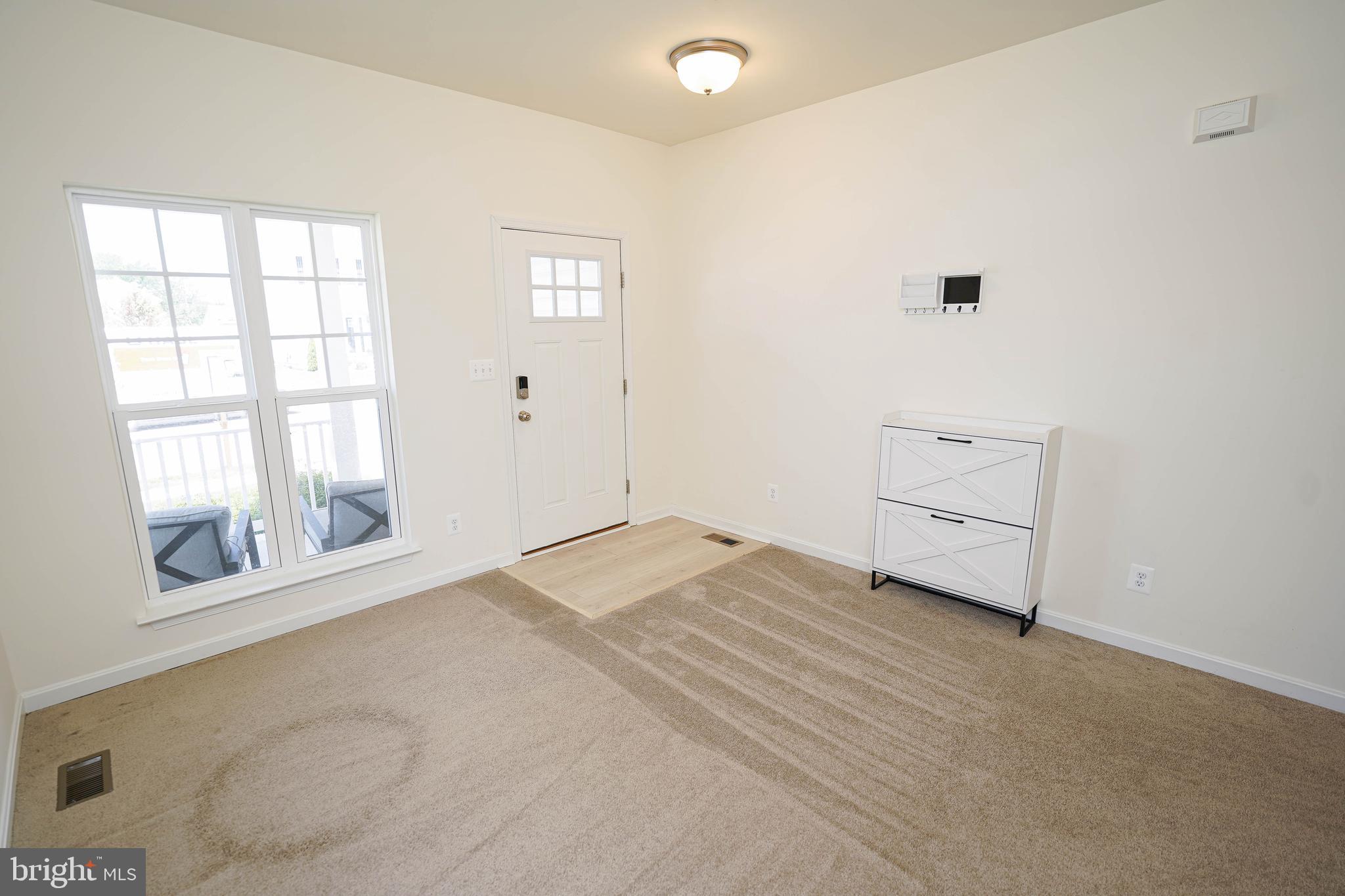 322 Appleby School Road Cambridge, MD 21613 - Photo 15 of 58 an empty room with windows