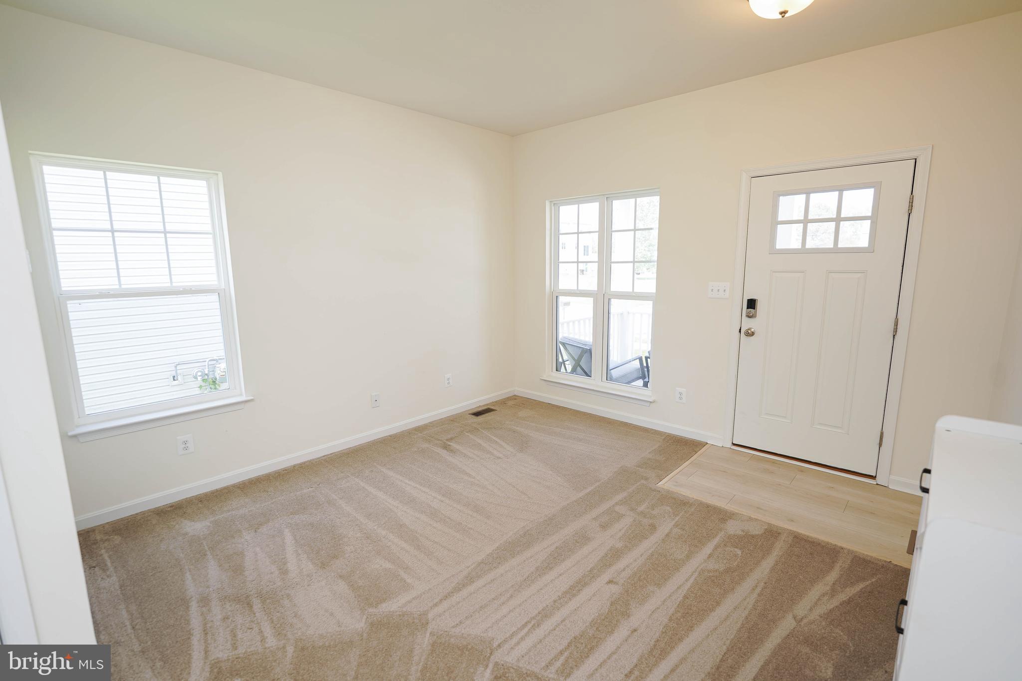 322 Appleby School Road Cambridge, MD 21613 - Photo 16 of 58 a view of an empty room with a window