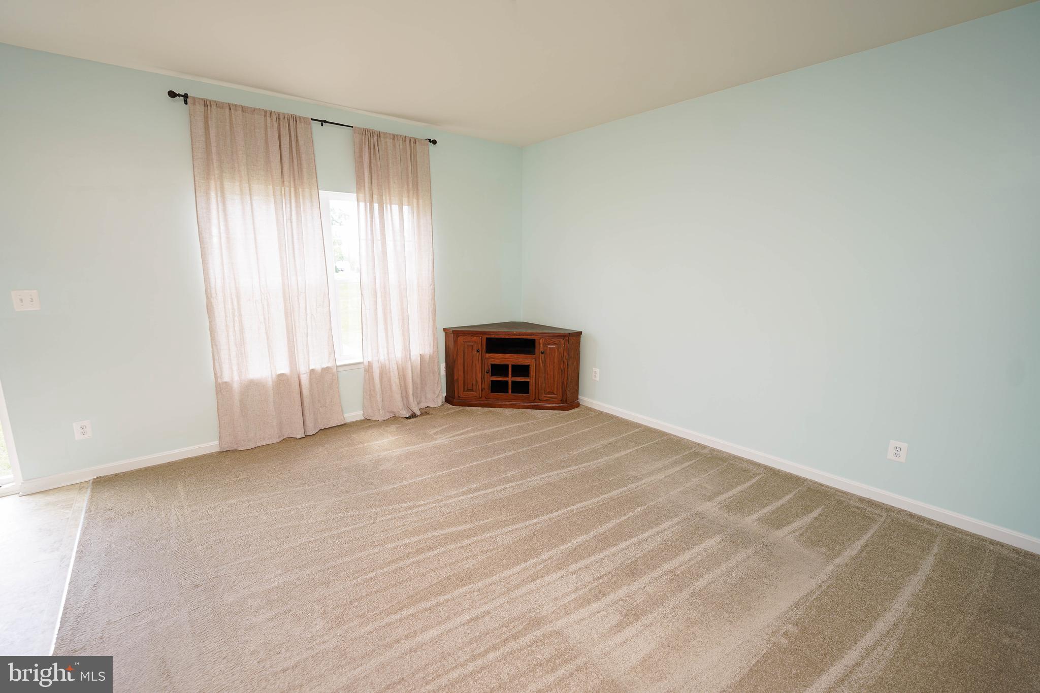 322 Appleby School Road Cambridge, MD 21613 - Photo 23 of 58 a view of a room with wooden floor