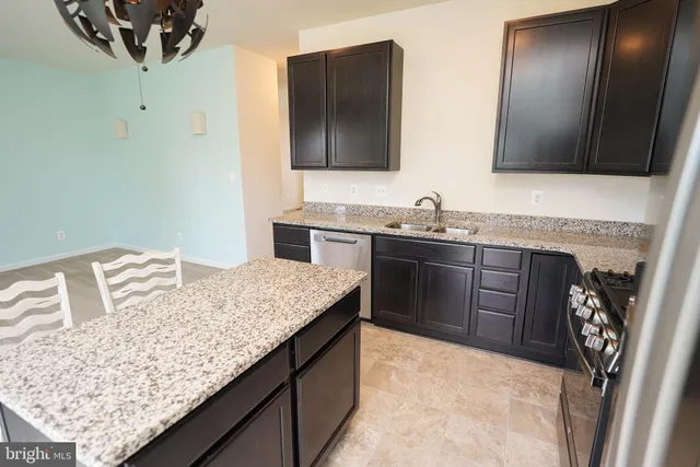 a bathroom with a sink and vanity