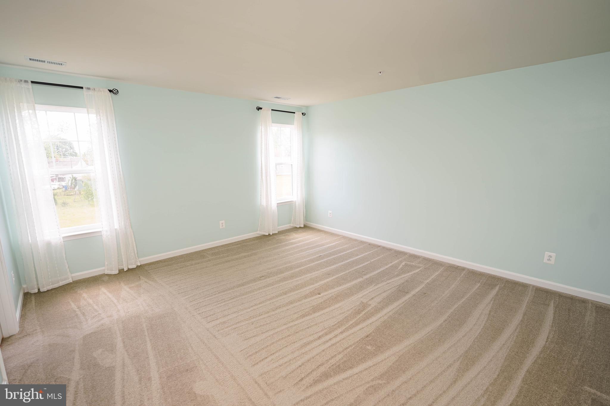 322 Appleby School Road Cambridge, MD 21613 - Photo 37 of 58 a view of an empty room with a window