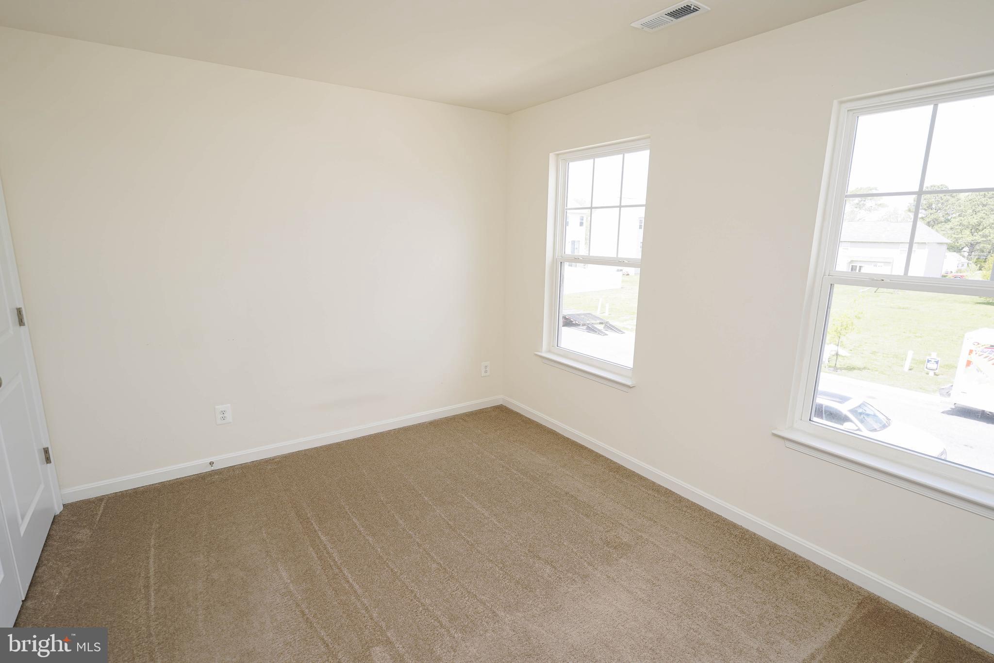 322 Appleby School Road Cambridge, MD 21613 - Photo 54 of 58 an empty room with windows
