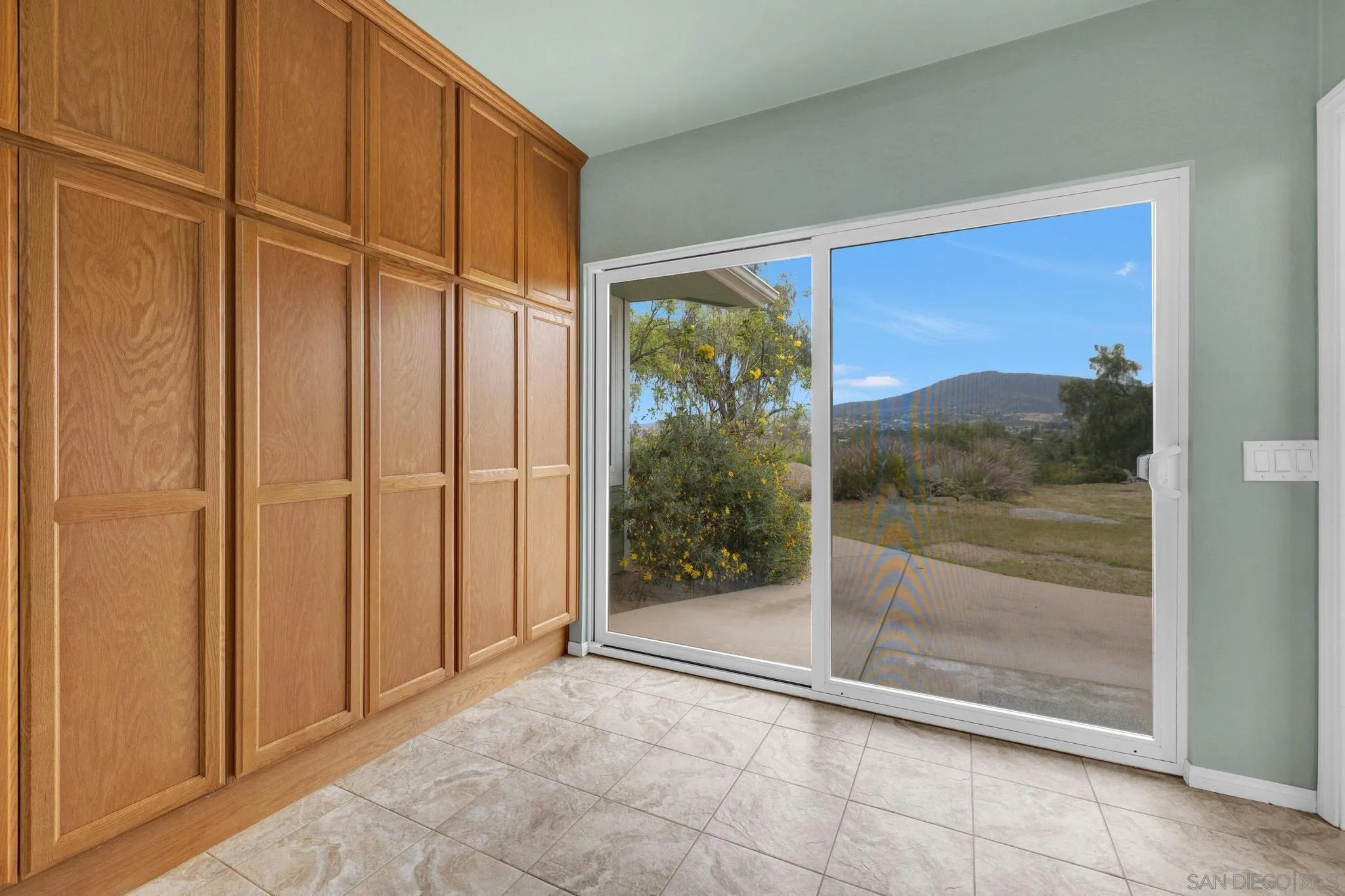 1421 South Grade Road Alpine, CA 91901 - Photo 23 of 59 a view of a glass door with a yard