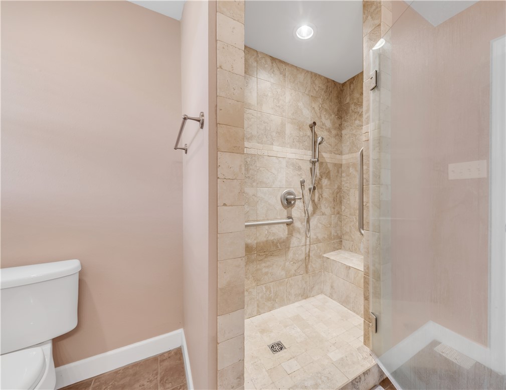 5732 Rose Hill Road Calvert, TX 77837 - Photo 11 of 46 a bathroom with a shower and toilet