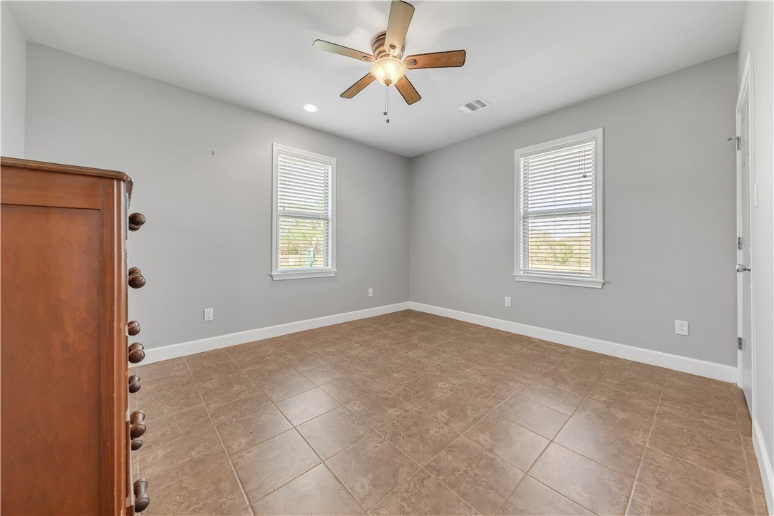 5732 Rose Hill Road Calvert, TX 77837 - Photo 12 of 46 a view of an empty room with a window