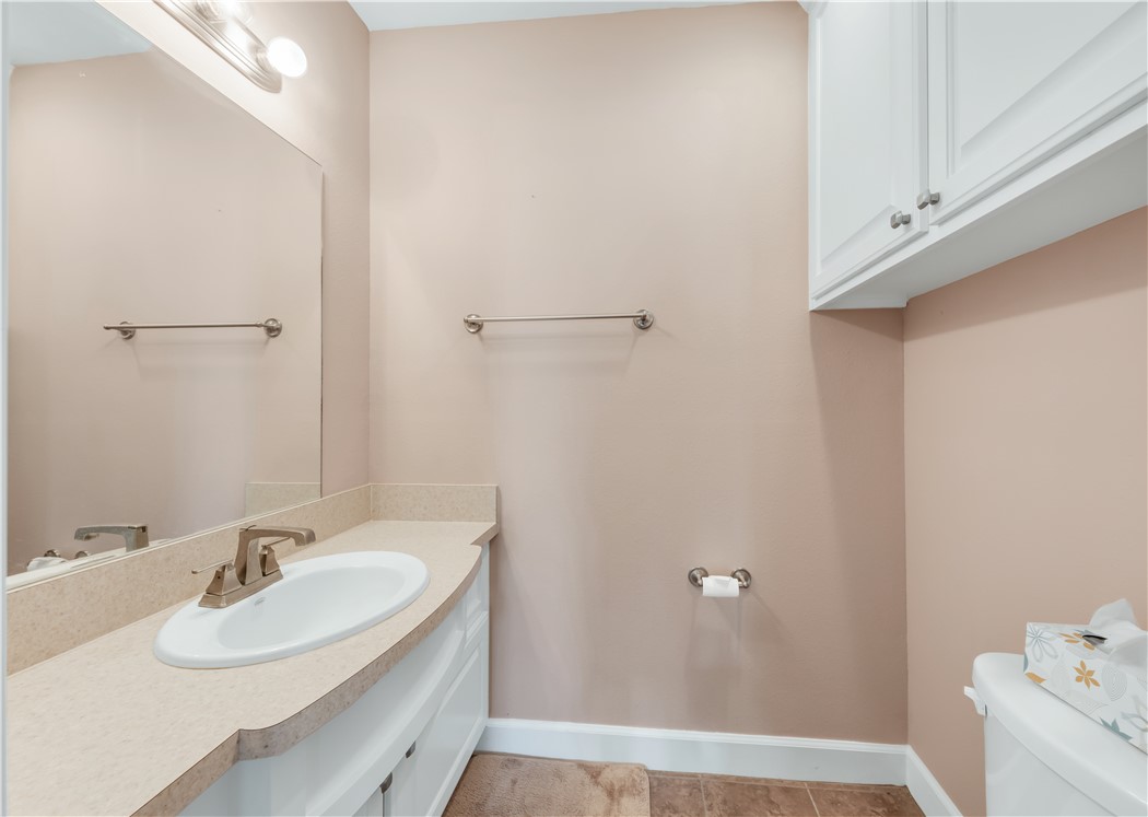 5732 Rose Hill Road Calvert, TX 77837 - Photo 13 of 46 a bathroom with a sink and a mirror