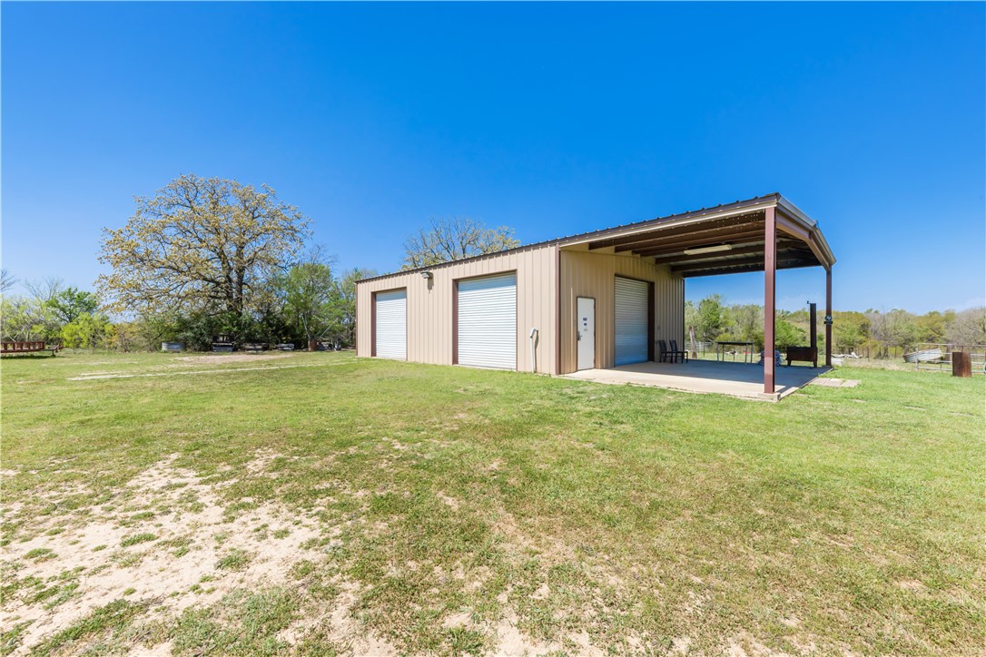 5732 Rose Hill Road Calvert, TX 77837 - Photo 14 of 46 a view of a house with backyard and garden