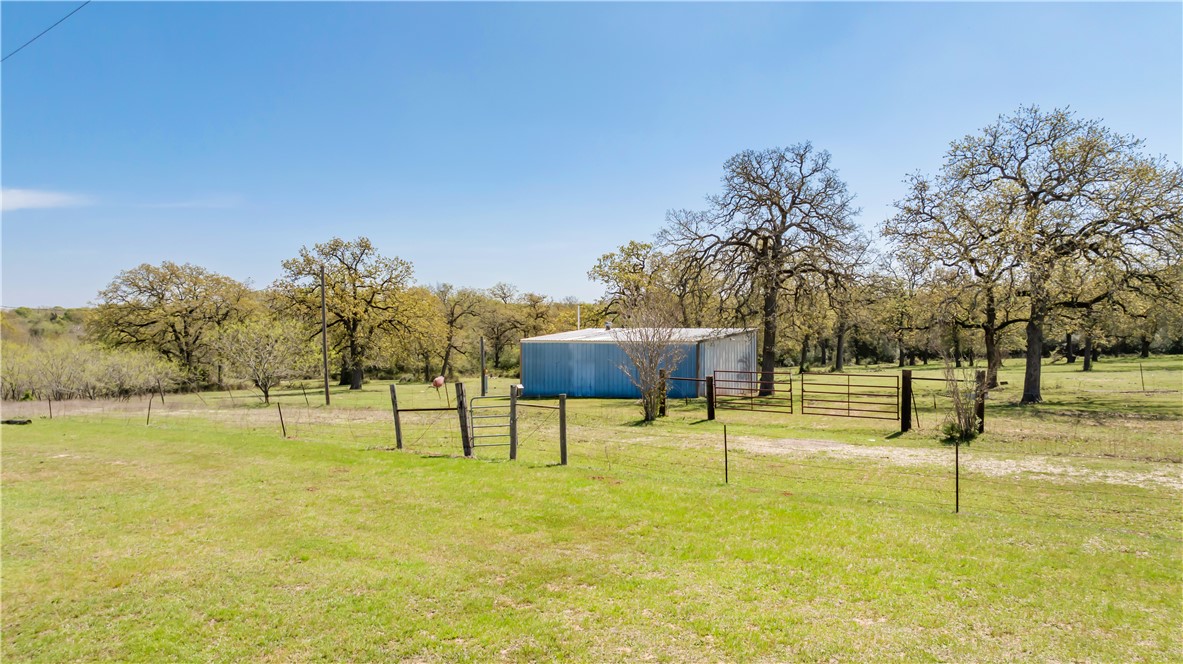 5732 Rose Hill Road Calvert, TX 77837 - Photo 29 of 46 a view of an outdoor space and swimming pool