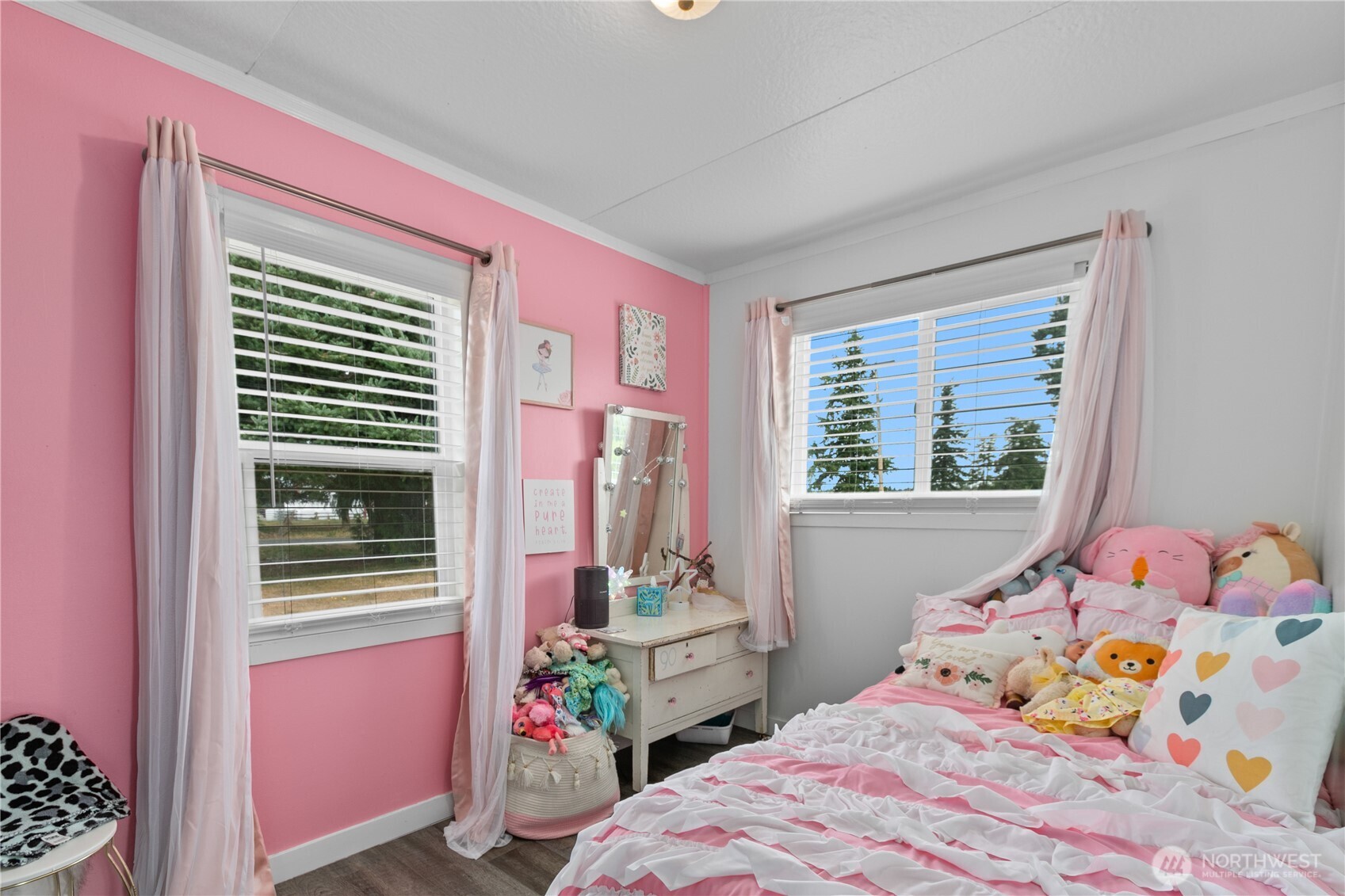 9112 Axling Road Lynden, WA 98264 - Photo 23 of 38 a bedroom with a bed and a window