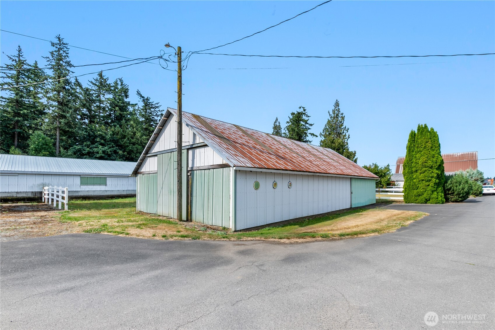 9112 Axling Road Lynden, WA 98264 - Photo 26 of 38 a view of a house with outdoor space and sitting area
