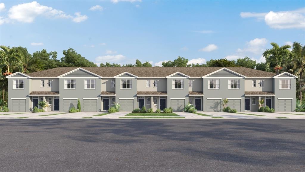 31199 Midnight Sun Way Wesley Chapel, FL 33545 - Photo 1 of 22 a view of a white house with a yard