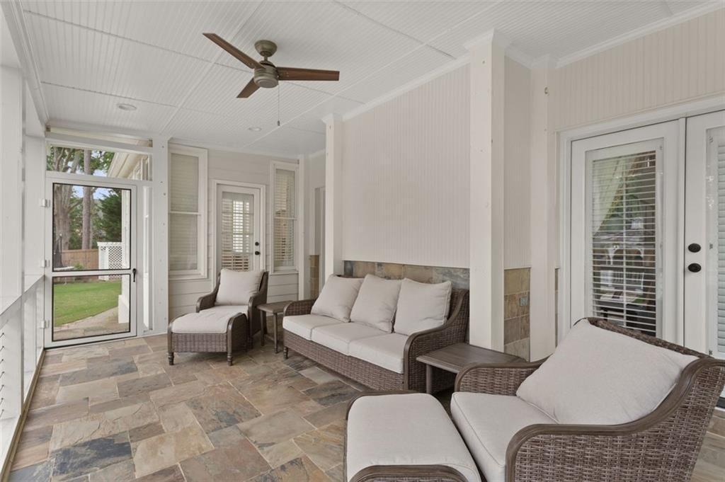 415 Lyerly Pointe Alpharetta, GA 30022 - Photo 28 of 62 a living room with furniture and a large window
