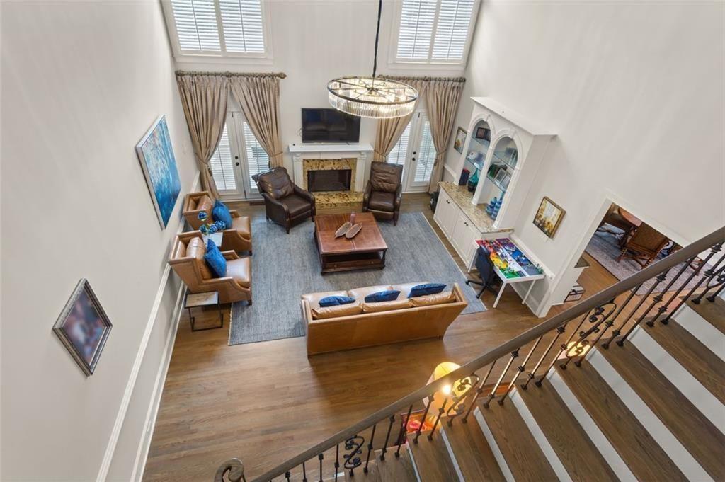 415 Lyerly Pointe Alpharetta, GA 30022 - Photo 53 of 62 a living room with furniture and a flat screen tv