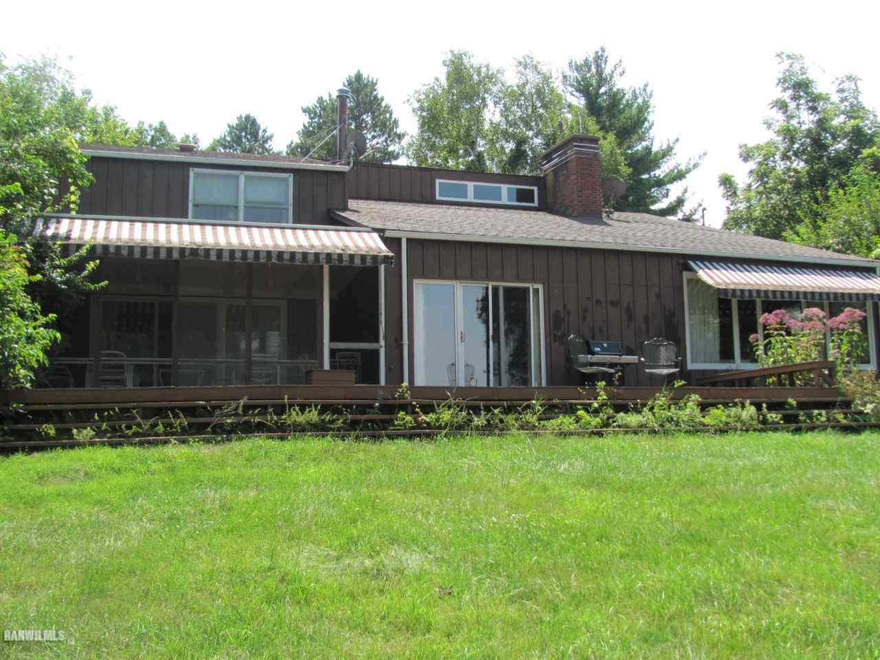 4302 South Blanding Road Hanover, IL 61041 - Photo 14 of 22 a view of a house with garden