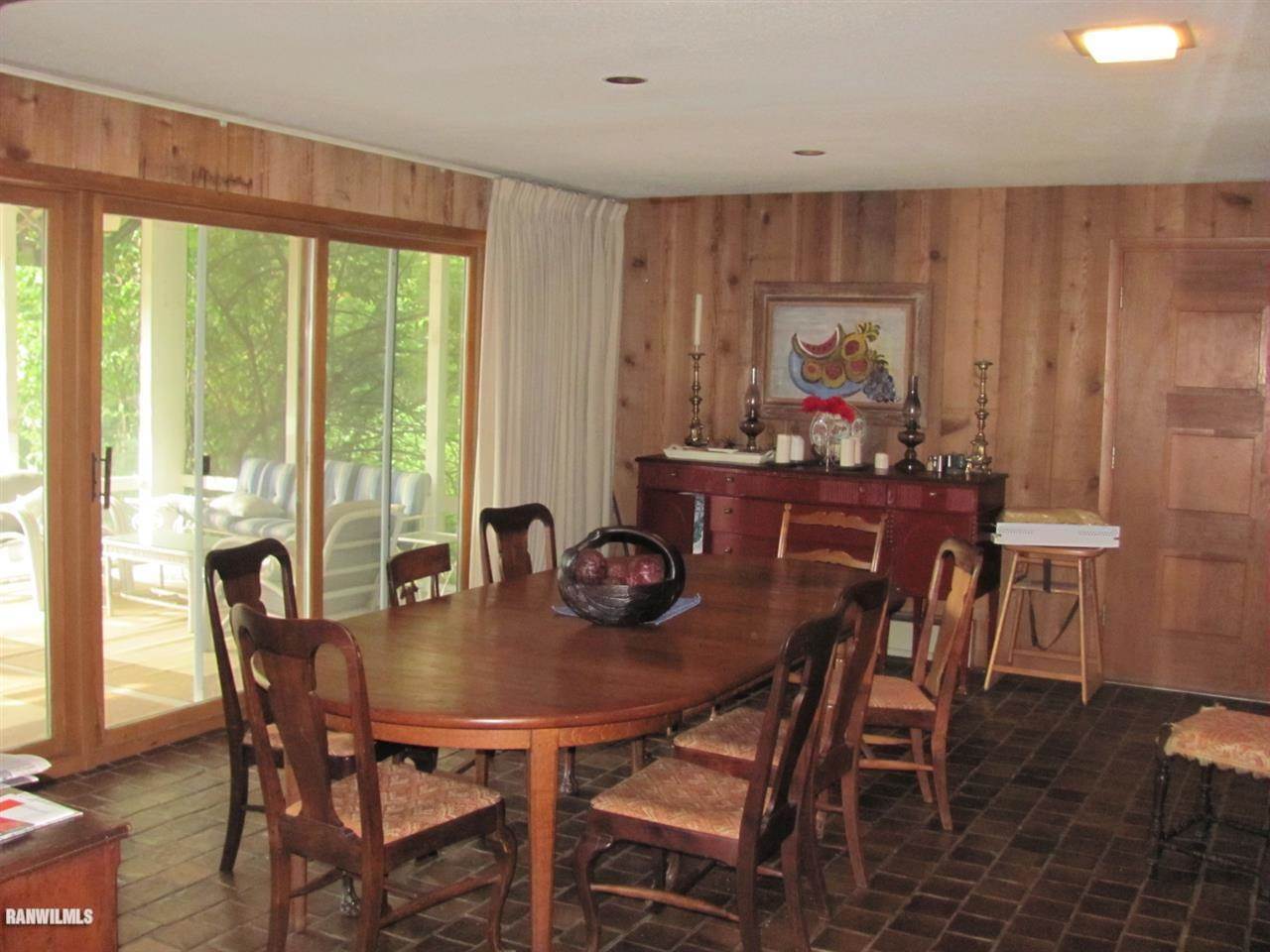 4302 South Blanding Road Hanover, IL 61041 - Photo 4 of 22 a dining room with furniture and window
