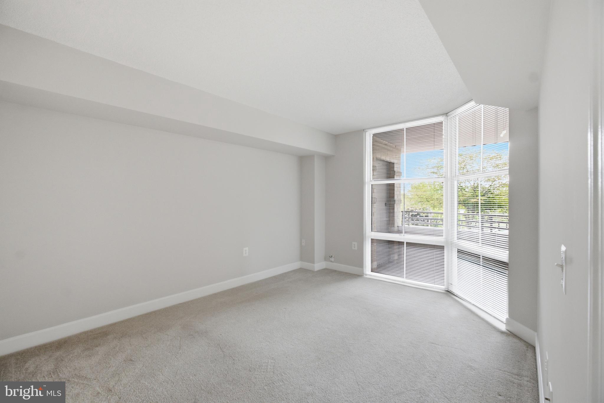 11800 Sunset Hills Road, Unit 202 Reston, VA 20190 - Photo 14 of 62 Bedroom 1 w lots of natural light