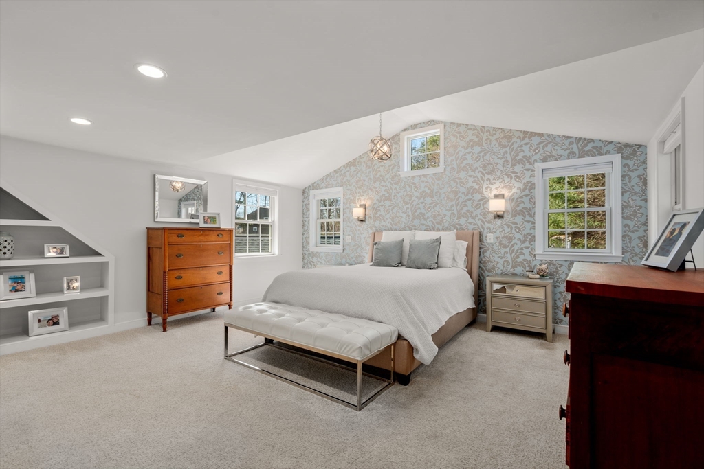 1 Sedgemeadow Road Wayland, MA 01778 - Photo 27 of 42 a spacious bedroom with a bed and dresser