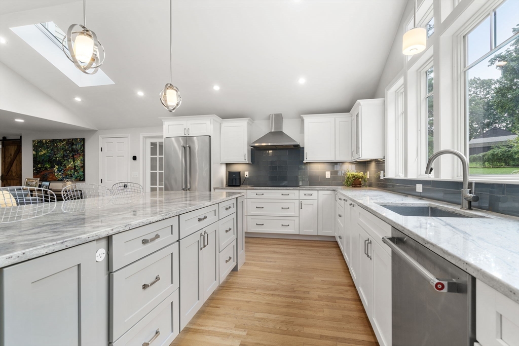 1 Sedgemeadow Road Wayland, MA 01778 - Photo 9 of 42 a large kitchen with granite countertop lots of counter space and window