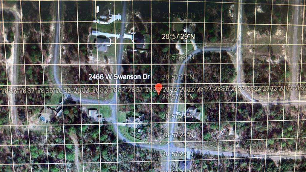 2466 West Swanson Drive Citrus Springs, FL 34434 - Photo 9 of 19 a view of a gate and a window