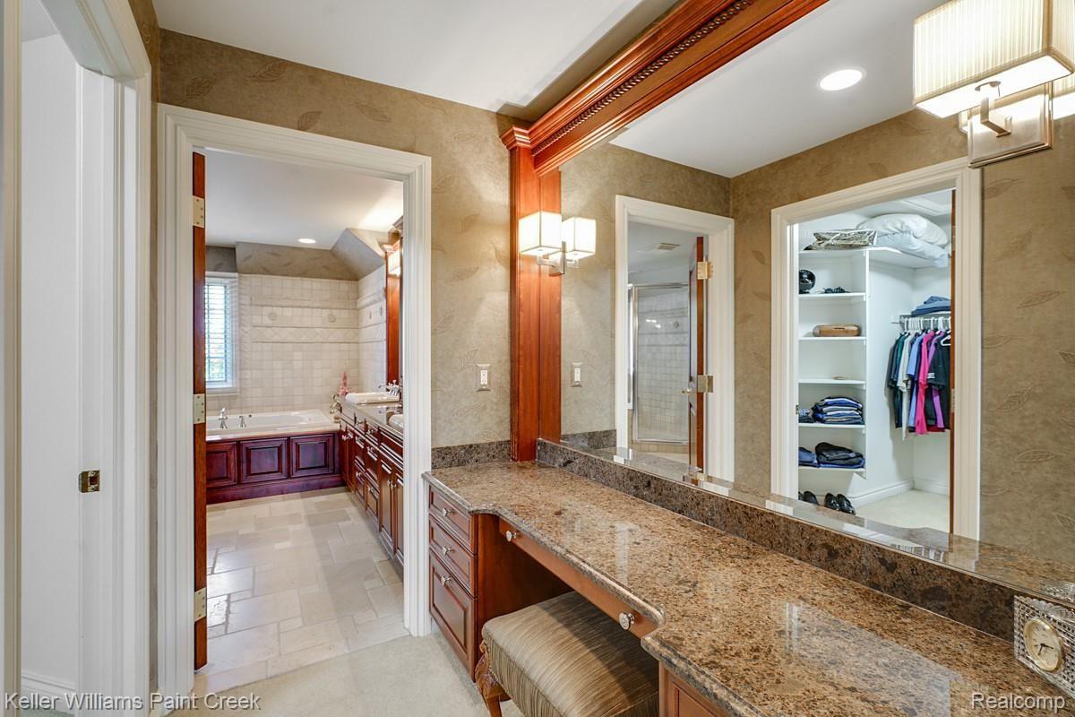 4902 Crestone Way Rochester, MI 48306 - Photo 45 of 70 Generously sized, Dual Walk-in Closets with Dressing area.
