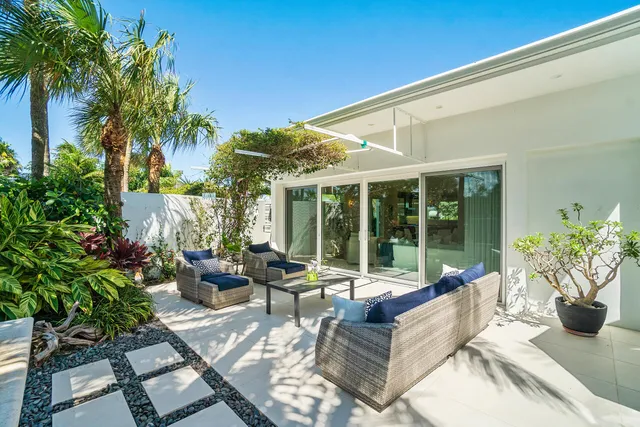 a view of a table and chairs in patio