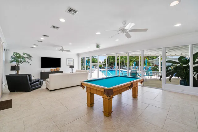 a view of a park with swings and slides