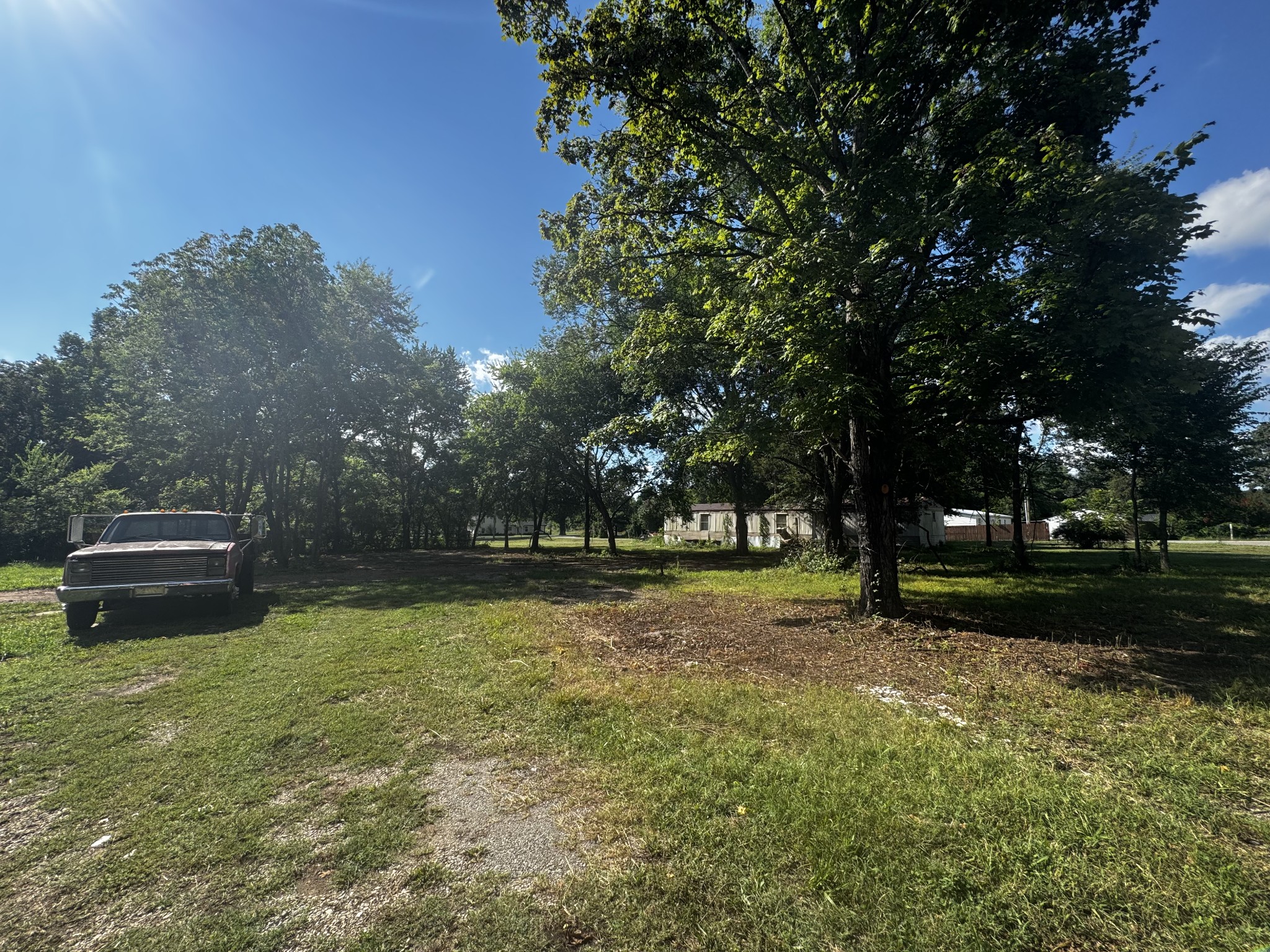 6257 East Buckeye Bottom Road Murfreesboro, TN 37129 - Photo 3 of 4 a view of a yard with trees