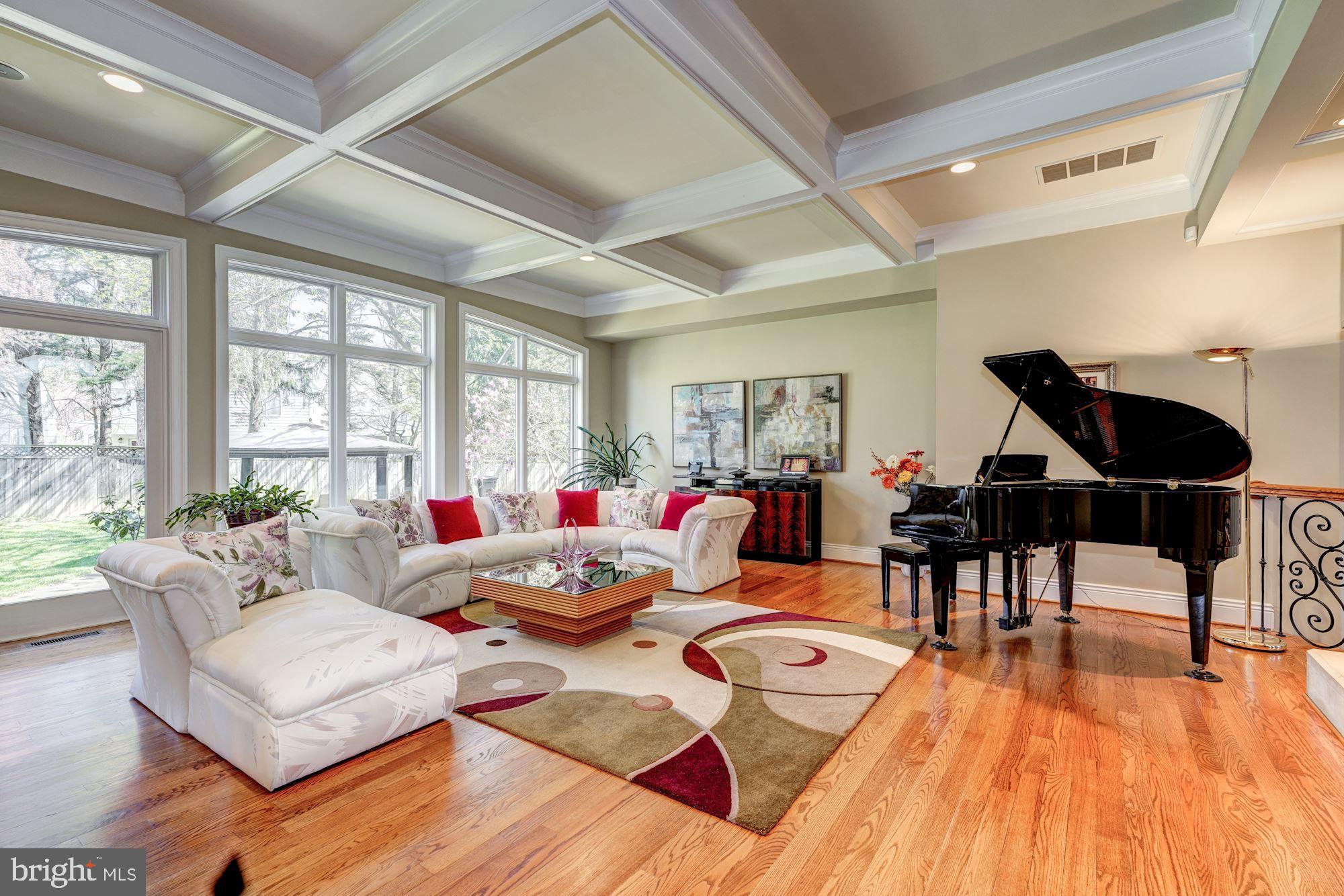 3809 Jones Bridge Road Chevy Chase, MD 20815 - Photo 17 of 70 a living room with furniture and wooden floor
