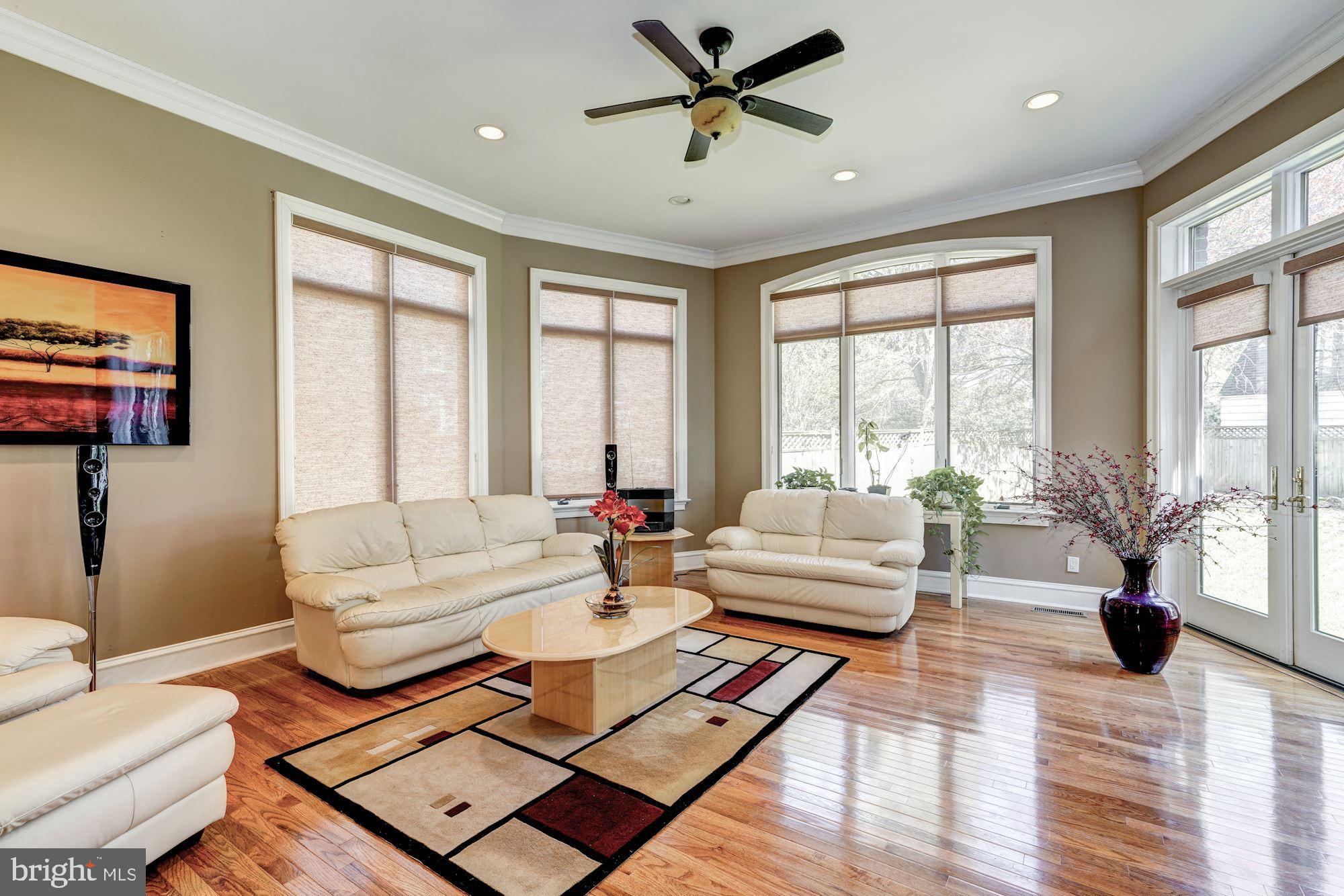 3809 Jones Bridge Road Chevy Chase, MD 20815 - Photo 33 of 70 a living room with furniture and a large window