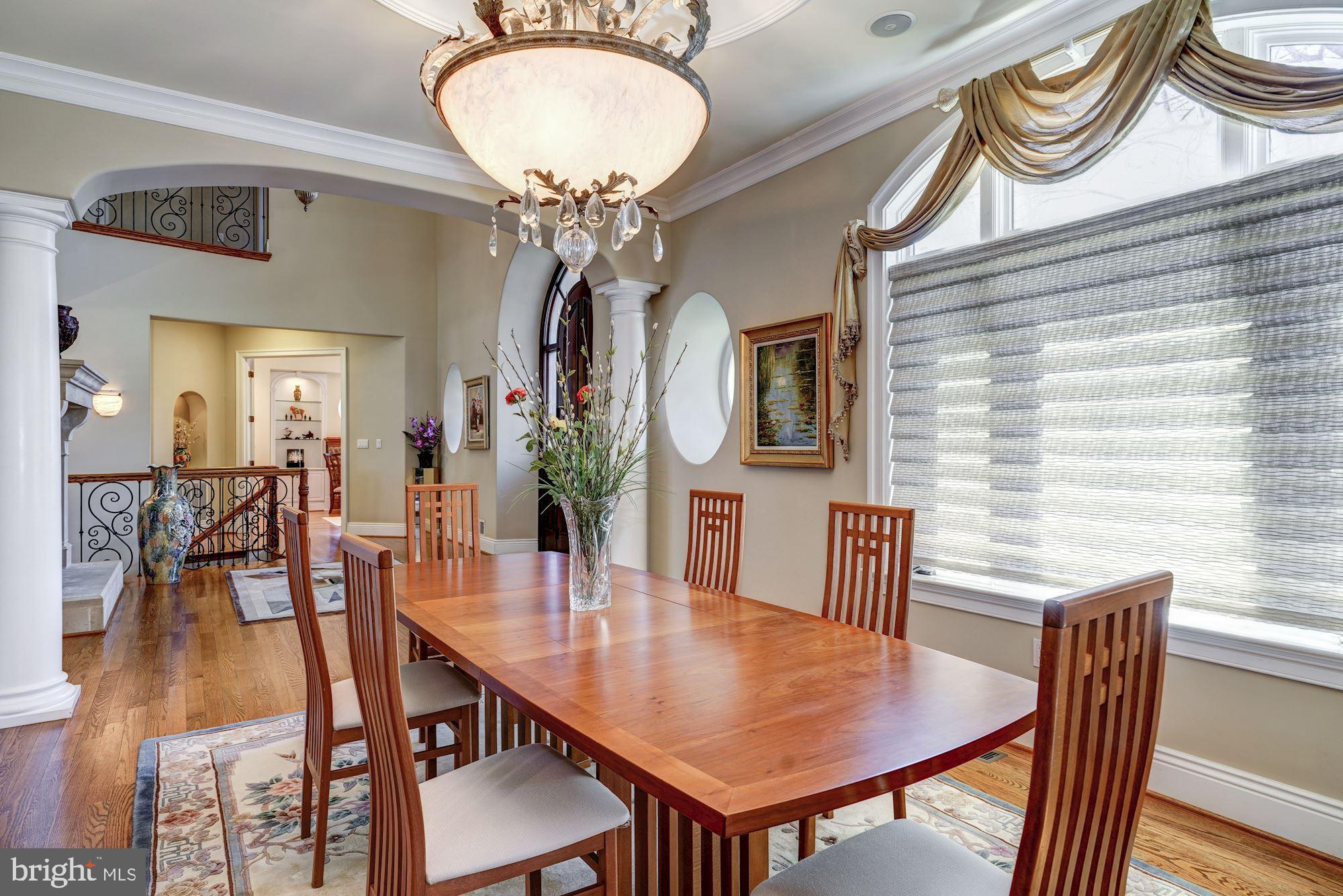 3809 Jones Bridge Road Chevy Chase, MD 20815 - Photo 10 of 70 a view of a dining room with furniture