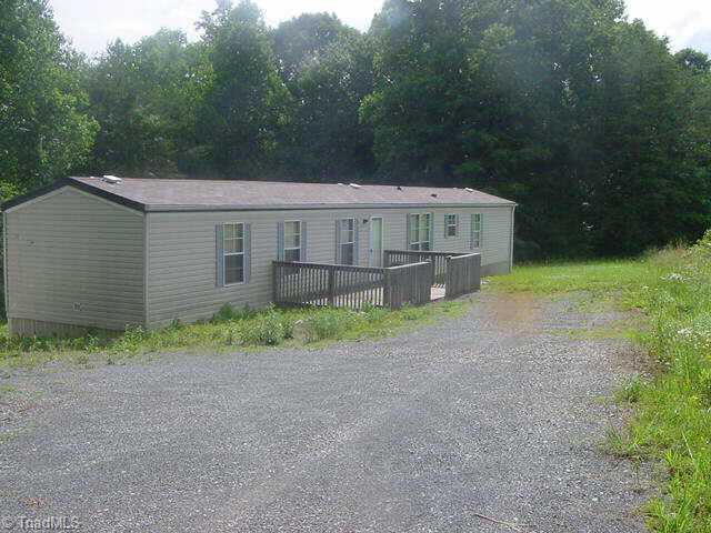 710 Flynt Road King, NC 27021 - Photo 1 of 9 Exterior Front. Private and secluded,Great setting for deer and turkey