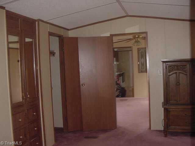 710 Flynt Road King, NC 27021 - Photo 8 of 9 Other. His and Her seperate closets in master bedroom
