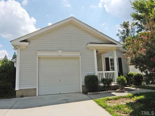 4709 Silverdene Street Raleigh, NC 27616 - Photo 2 of 15 a front view of a house with garden