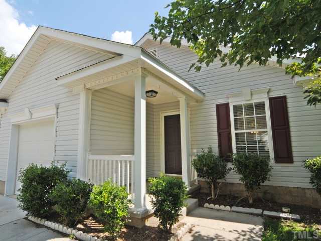 4709 Silverdene Street Raleigh, NC 27616 - Photo 3 of 15 a front view of a house with garden