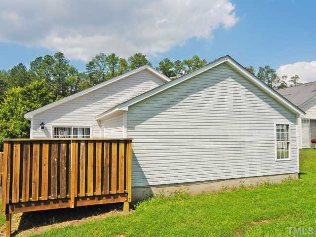 4709 Silverdene Street Raleigh, NC 27616 - Photo 4 of 15 a view of a backyard with a garden