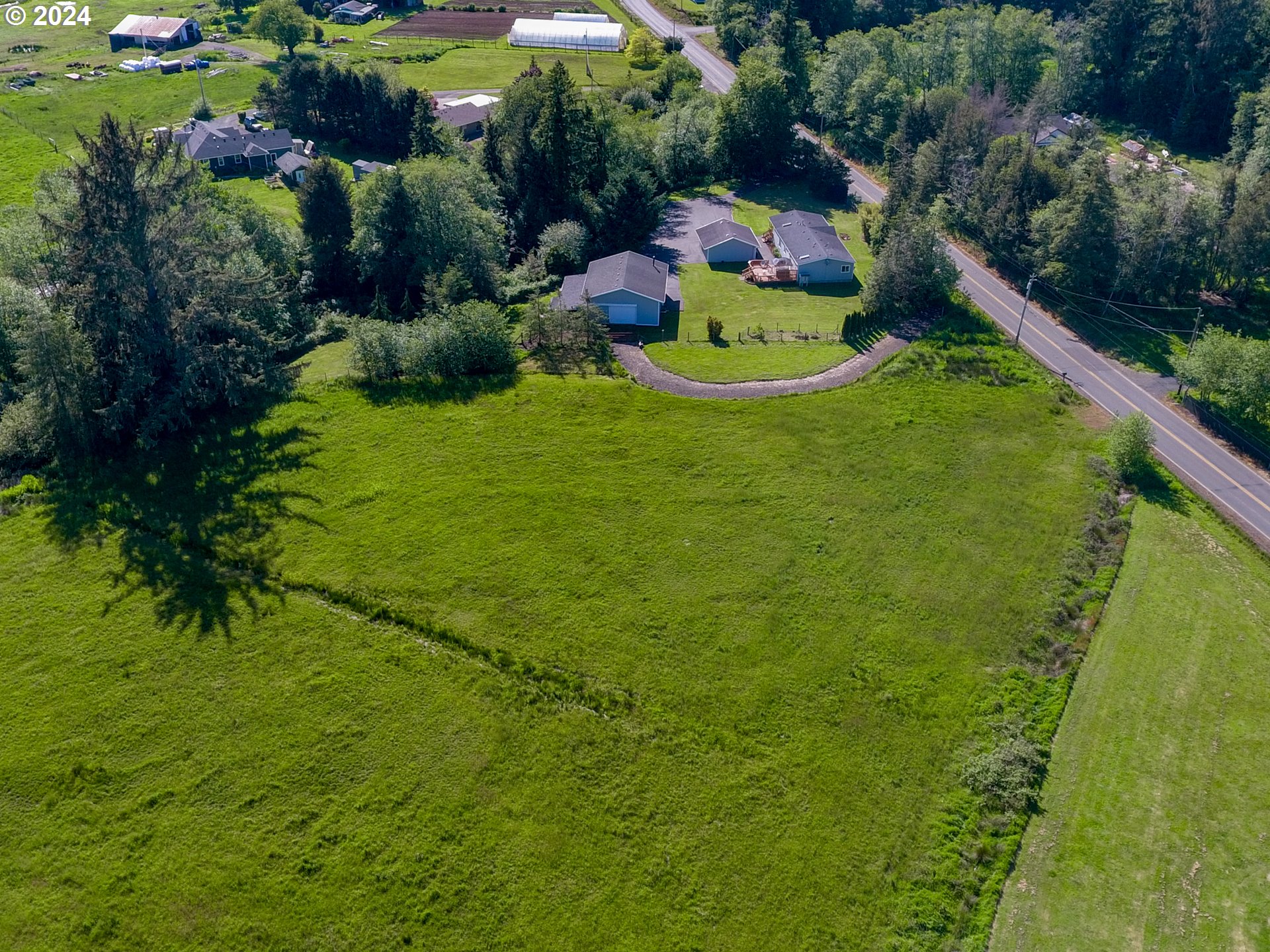 Logan Road Astoria, OR 97103 - Photo 6 of 14 a view of a lake with a house