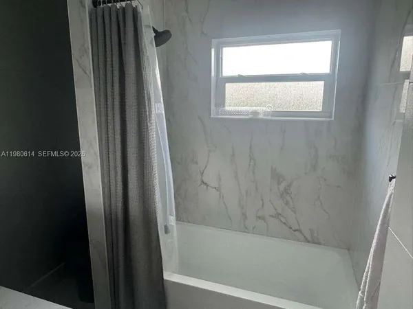a bathroom with a bathtub