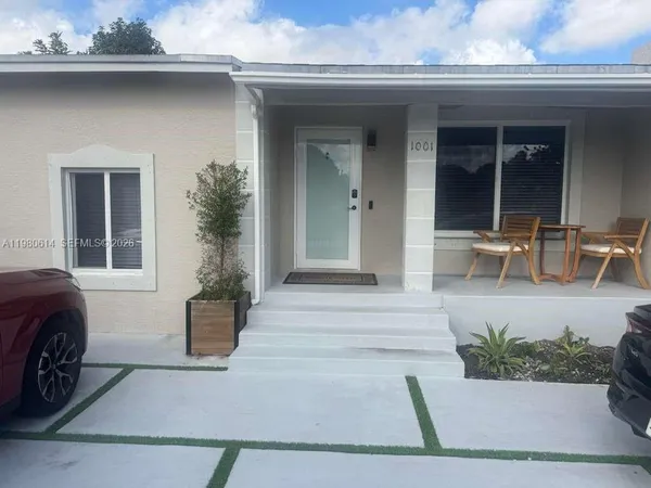 a view of house with outdoor space and porch