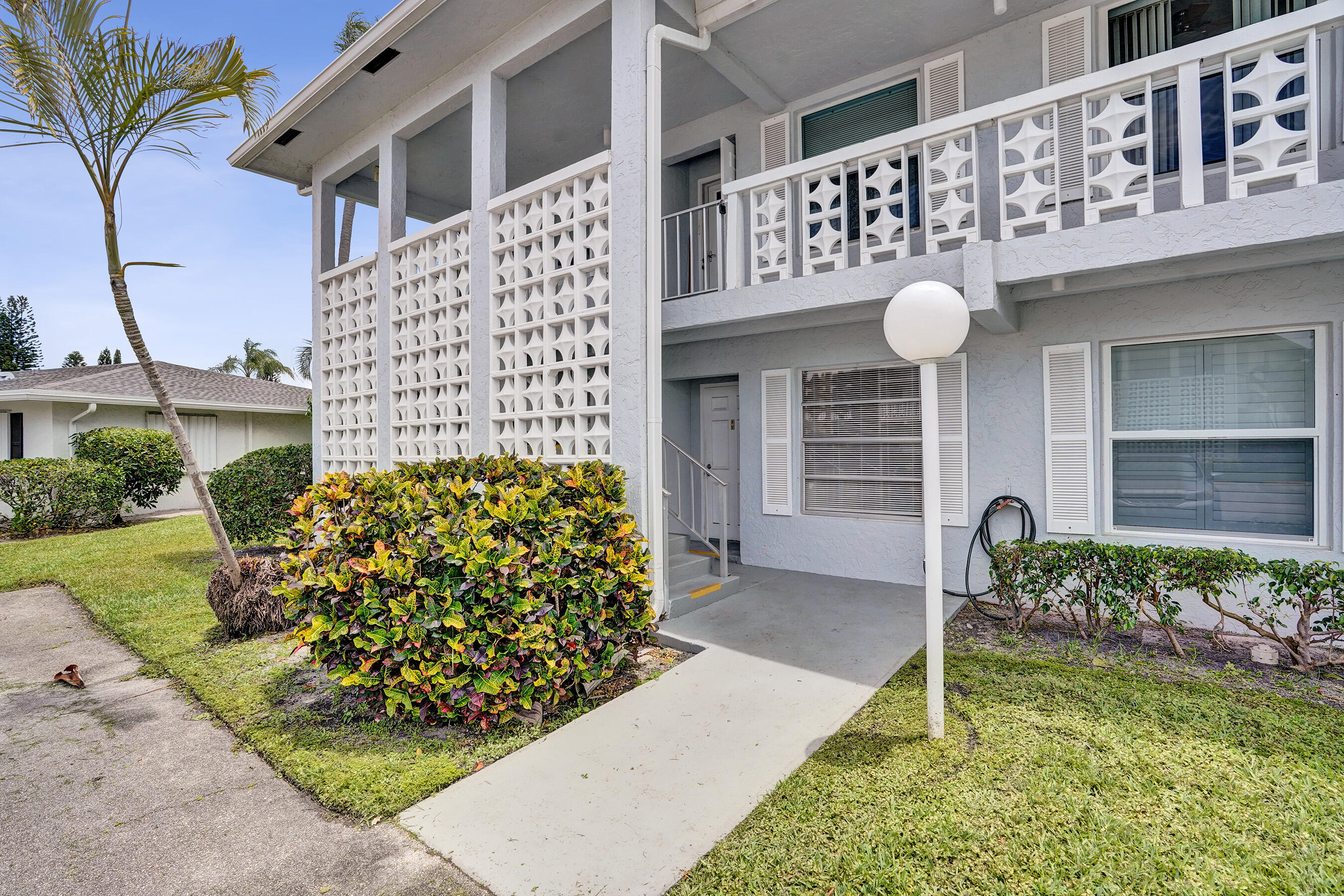 2820 Southwest 13th Street, Unit 101 Delray Beach, FL 33445 - Photo 2 of 83 First floor corner