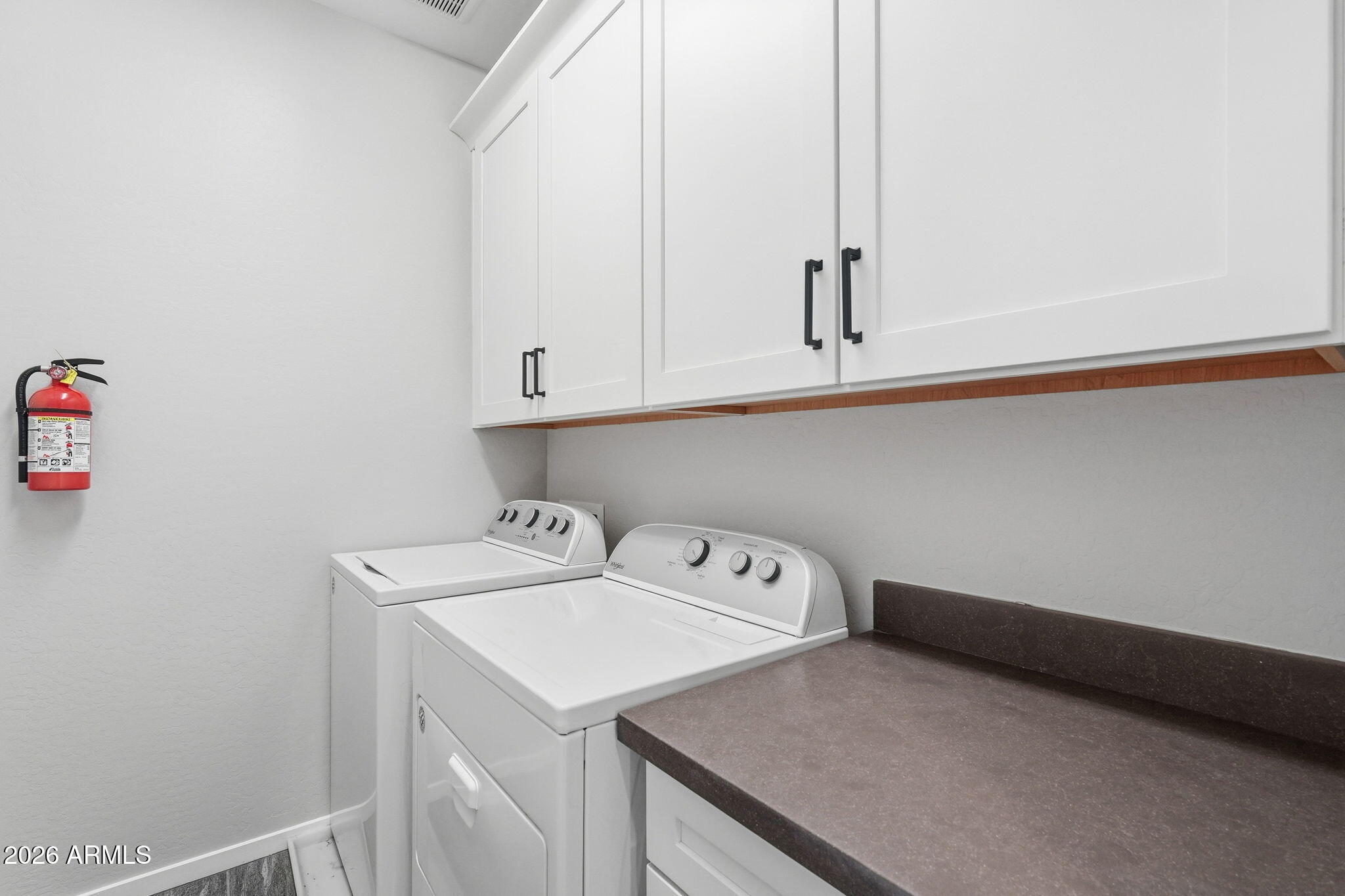 901 South Smith Road, Unit 1038 Tempe, AZ 85281 - Photo 28 of 29 a utility room with dryer and washer