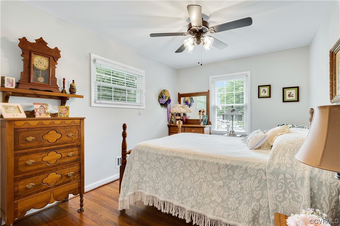 9117 Mapleview Avenue Henrico, VA 23294 - Photo 14 of 21 a bedroom with a bed and a flat tv screen on the dresser