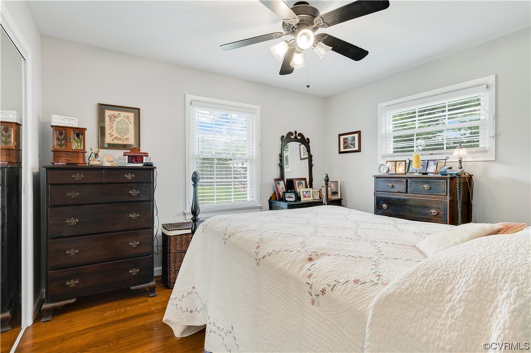 9117 Mapleview Avenue Henrico, VA 23294 - Photo 16 of 21 a bedroom with a bed and wooden floor