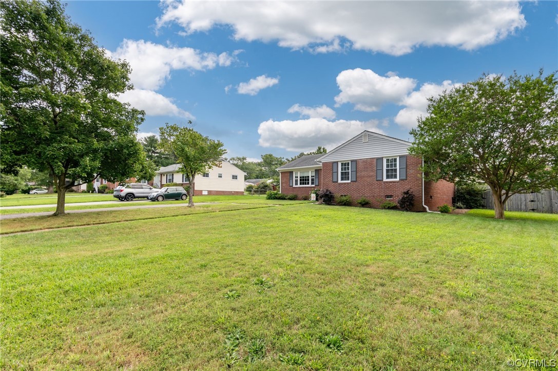 9117 Mapleview Avenue Henrico, VA 23294 - Photo 19 of 21 a front view of house with an outdoor space and seating