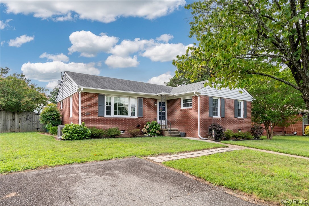 9117 Mapleview Avenue Henrico, VA 23294 - Photo 21 of 21 a view of a yard in front of a house