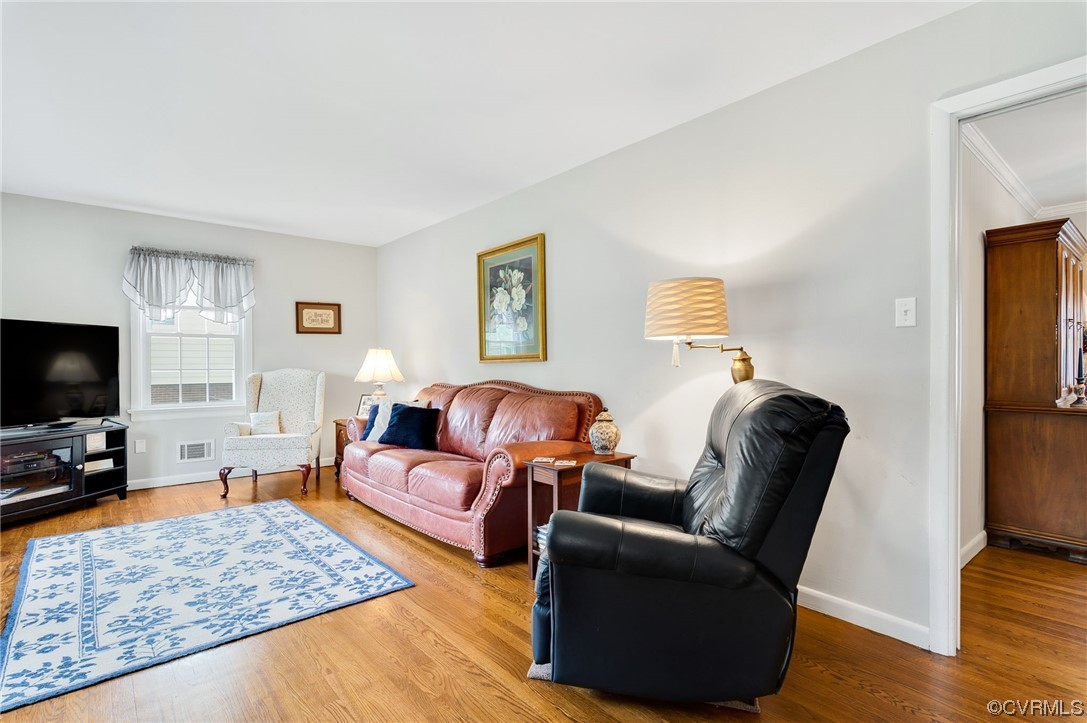 9117 Mapleview Avenue Henrico, VA 23294 - Photo 5 of 21 a living room with furniture and a flat screen tv