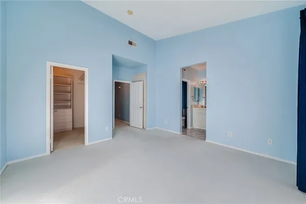 a view of an empty walk in closet